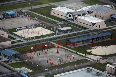 Migrants at Ice jail in Miami made to kneel to eat ‘like dogs’, report alleges