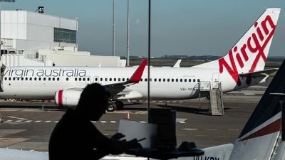Fire breaks out onboard Virgin flight in landing drama