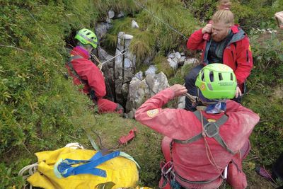 Cave explorer trapped after being hit by fallen rocks 130 feet underground