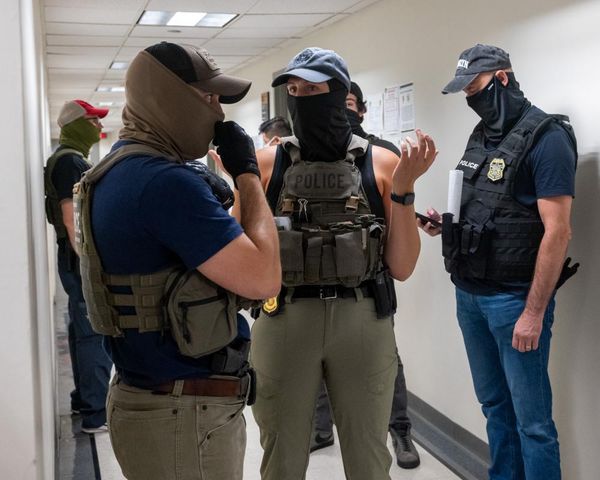 Ice officers to be allowed to continue wearing masks despite controversy – US politics live