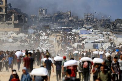 Palestinians queuing for aid in Gaza describe terrifying moment soldiers opened fire, killing 73