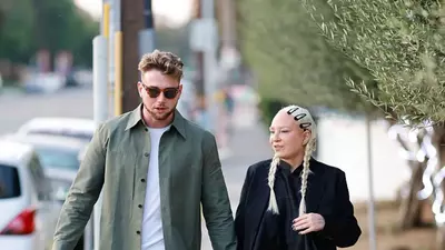 Did Sia ditch husband for 21-year-younger reality star just months after secret baby bombshell?