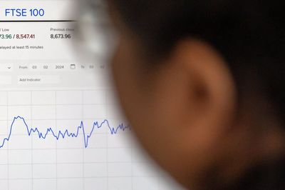 FTSE 100 ends day above 9,000 points for first time