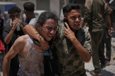 ‘Skeletons marching to death’: Palestinians face hunger and gunfire as Israel pushes into central Gaza