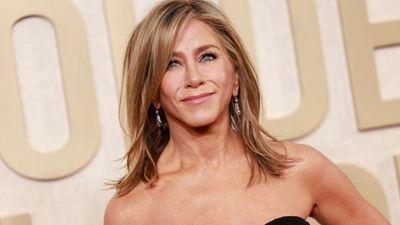 Jennifer Aniston's lacy cami and cool aviators epitomise casual summer styling