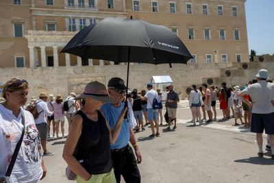 Greece shuts Acropolis and tells outdoor workers to down tools as country scorches in extreme heatwave