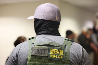 DOJ Staffer Suddenly Fired After 10 Years Says It Was 'Retribution' For Husband's Anti-ICE App