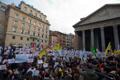 Italy constitutional court says non-biological mother in same-sex union entitled to paternity leave
