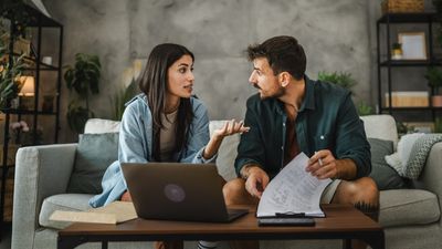 Here’s How To Talk About Money To Feel Closer to Your Spouse, According to Dave Ramsey