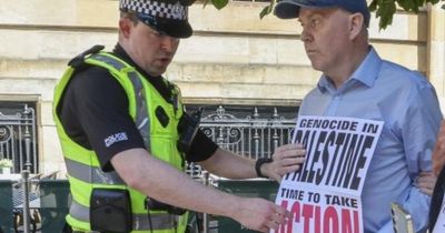 Man arrested at pro-Palestine protest for holding sign breaks silence
