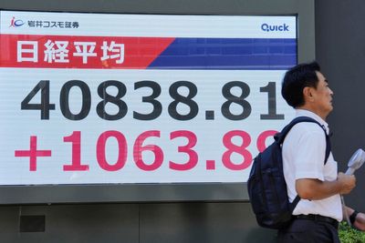 Asian markets gain, with Japan's Nikkei up more than 3%, lifted by deal on Trump's tariffs