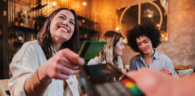 Time to ditch splitting the bill? Shouting a close friend could actually make you happier