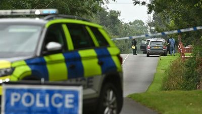 Two children among three dead in shooting in Northern Ireland, police say