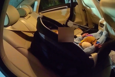Parents leave baby asleep in car with engine still running to go drinking at bar