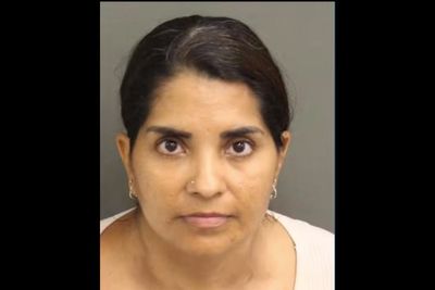 Disney mom faces child abuse charge after she allegedly grabbed a teen in a fight as crowd gathered to watch Magic Kingdom parade