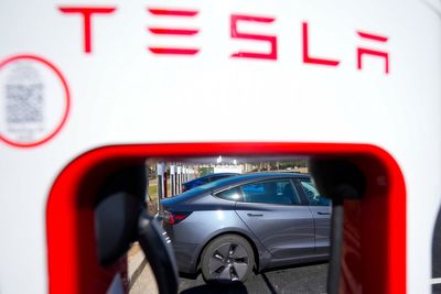 Business news live: FTSE 100 rises to new record level and Tesla shares sink after Elon Musk warning
