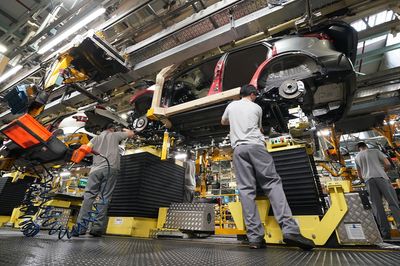 Growth slows across UK private sector as job cuts accelerate