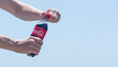 Here's How Much Warren Buffett Pockets Every Time You Buy a Bottle of Coke
