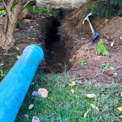 It isn't too late to install a French drain in your garden – and it could be the answer to your lawn's flooding problem