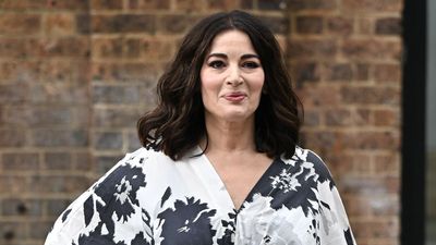 Nigella Lawson's monochrome florals and chunky trainers are total opposites - and they look utterly fabulous together