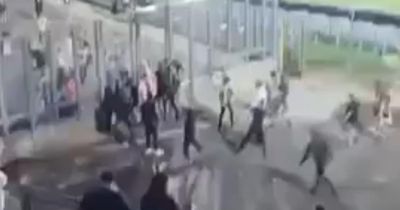 Moment Celtic & Ajax supporters clash during Como Cup match