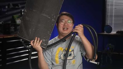Someone cooled AMD's $11,699 Threadripper Pro 9995WX with a BMW M4 radiator and some fans from a Toyota Highlander — 1,200 liters per minute pump still can't match liquid nitrogen, though