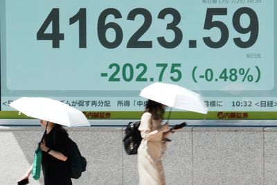 Asian shares retreat after Alphabet and AI stocks nudge Wall Street to more records