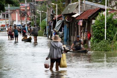 Boats Bring Philippine Flood Victims To Safety As Death Toll Rises