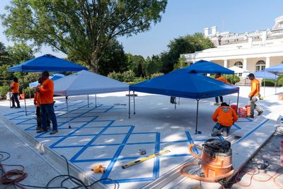AP PHOTOS: A look back at the White House Rose Garden as Trump's paved makeover nears completion