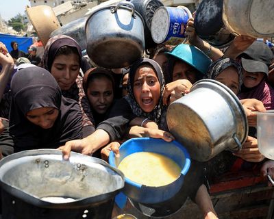 First Thing: ‘Hungry aid staff fainting’ as starvation spreads in Gaza and truce hopes fade