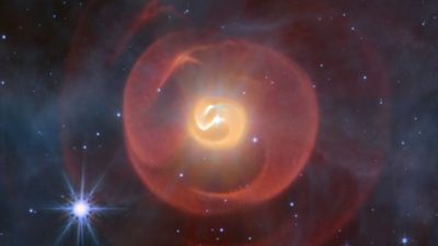 2 stars in 'serpent god of destruction' system are hurling their blazing guts at each other, James Webb telescope reveals