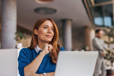 AI is driving mass layoffs in tech, but it's boosting salaries by $18,000 a year everywhere else, study says