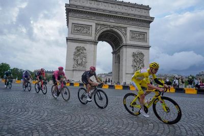 Tadej Pogacar reigns in Paris after winning Tour de France for fourth time