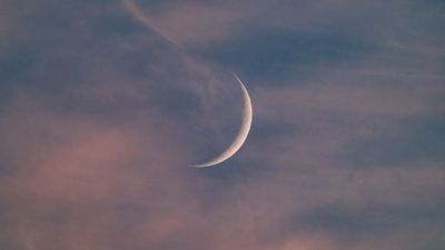 See Mars shine close to the waxing crescent moon after sunset on July 28