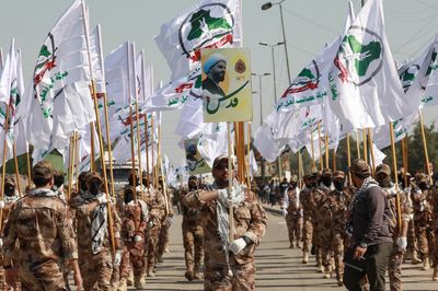 Gunfight in Baghdad kills one as paramilitary group storms ministry