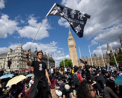 Hong Kong issues arrest warrants for 19 activists based overseas