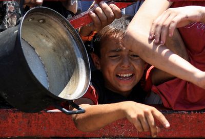 Israel kills more than 80 in Gaza as outrage over hunger crisis grows