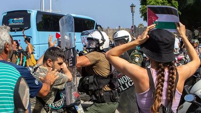 Riot police scuffle with demonstrators on Rhodes during visit by Israeli cruise ship