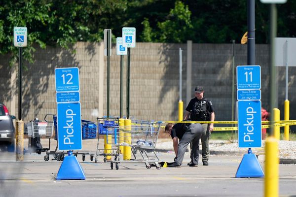Suspect in Michigan Walmart stabbings is charged with a rarely used state terrorism count