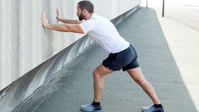 I'm a personal trainer, and this coach's 4-way stretch could relieve your tight ankles and boost lower-body mobility