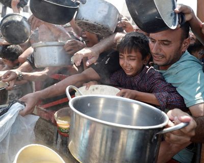 Famine under way in Gaza, UN-backed experts say, as war death toll passes 60,000