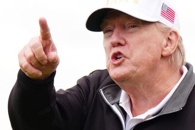 Trump opens his new Scottish golf course before return to US to ‘put out fires’