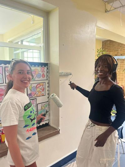 Volunteer 'angels' give primary school that had 40 windows smashed by vandals a make-over
