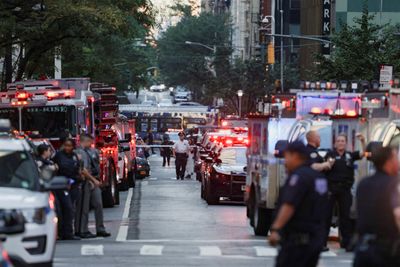 Five dead in New York City shooting, including police officer, suspect