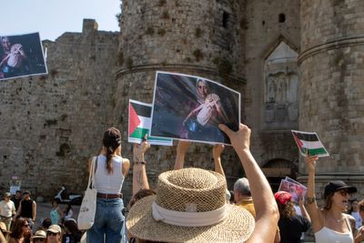 Police and protesters clash as Israeli cruise ship docks on tourist island