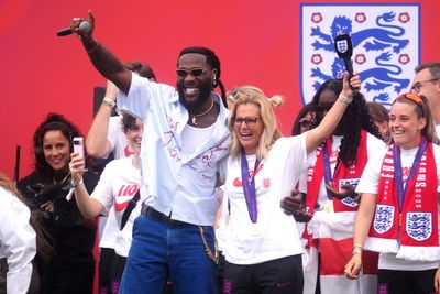 Burna Boy joins in Lionesses victory parade as he sings with Sarina Wiegman