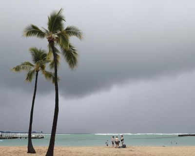 Major tsunami no longer expected to hit Hawaii but coasts remain hazardous