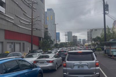 What is a tsunami and what should I do if I get an emergency alert?