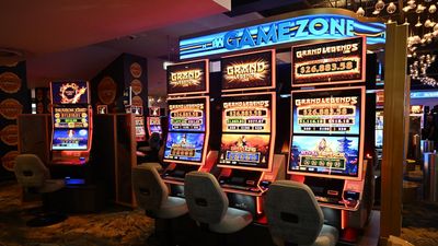 Pokies giant taken to court over money laundering gaps