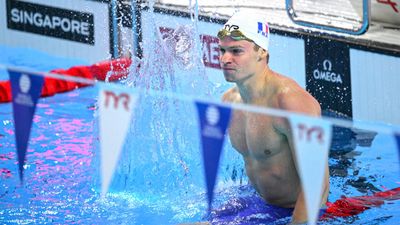 French star Marchand enhances legend with record at world swimming championships